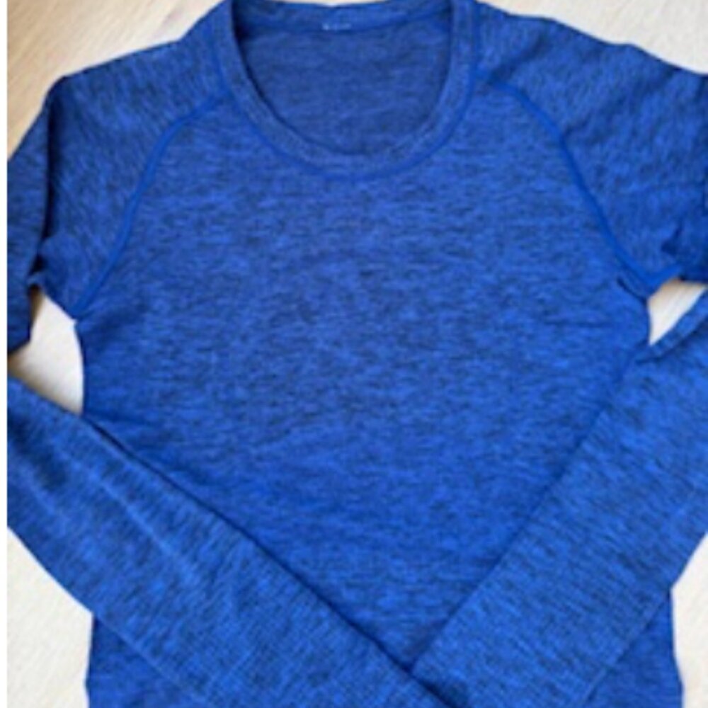 SWIFTY TECH LONG SLEEVE SHIRT 2.0 WAIST LENGHT SIZE: 4 BLUE / BLK